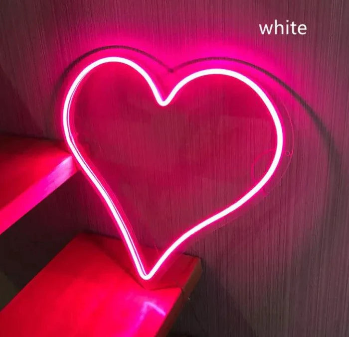 Mandotos Heart Glow LED neon light illuminating in pink, perfect for decorative wall or room lighting.