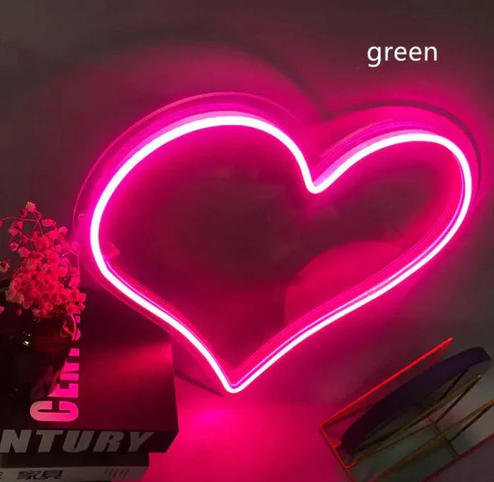 Mandotos Heart Glow LED Neon Light emitting a soft pink glow, perfect for home decor or ambient lighting.