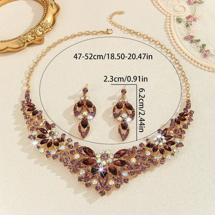 Mandotos crystal necklace and earrings suite featuring high-profile, generous design with sparkling clear crystals for elegant style.