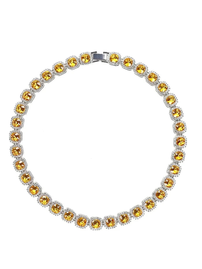 Mandotos Illumina tennis chain with clustered stones and radiant embellishments, showcasing elegant jewelry design.