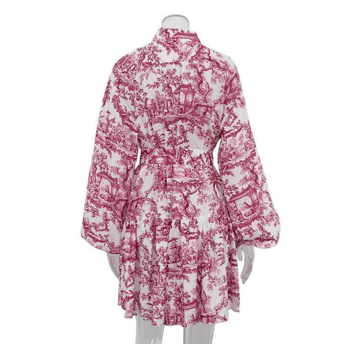 Mandotos ink print long sleeve short dress with puffy sleeves, lapel collar, tie waist, and A-line silhouette.