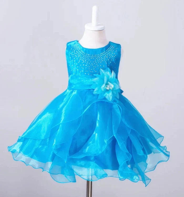 Kids glam dresses and gowns by MANDOTOS INTERNATIONAL featuring colorful, sparkly fabrics and elegant designs for special occasions.