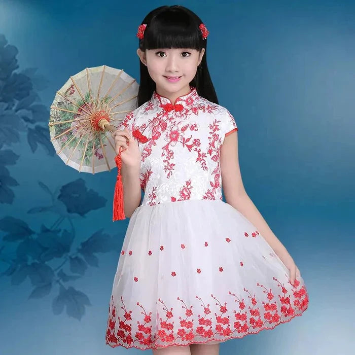 Colorful kids' summer dresses from MANDOTOS INTERNATIONAL, featuring lightweight fabrics and playful patterns.