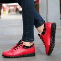 Mandotos Korean Student Shoes featuring black and white canvas design with white laces and rubber soles.