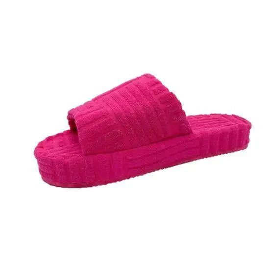 Mandotos ladies' plush slip-on slippers with soft, cozy interior and plush exterior for comfortable indoor wear.