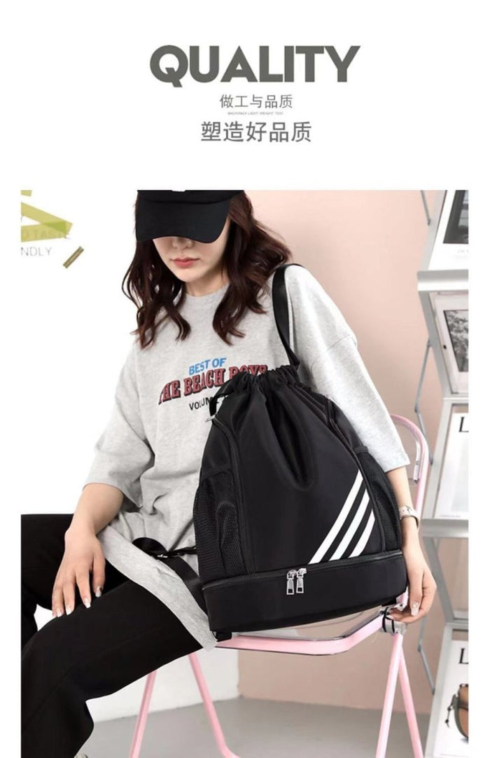 Large basketball backpack with drawstring pocket from MANDOTOS INTERNATIONAL, featuring multiple compartments and adjustable straps.