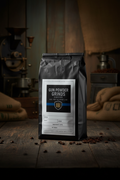 Gun Powder Grinds Latin American Blend on wooden surface