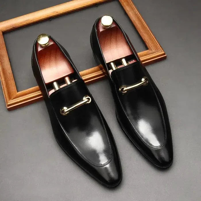 Mandotos men's leather loafers with sleek design, featuring smooth brown leather and classic slip-on style.