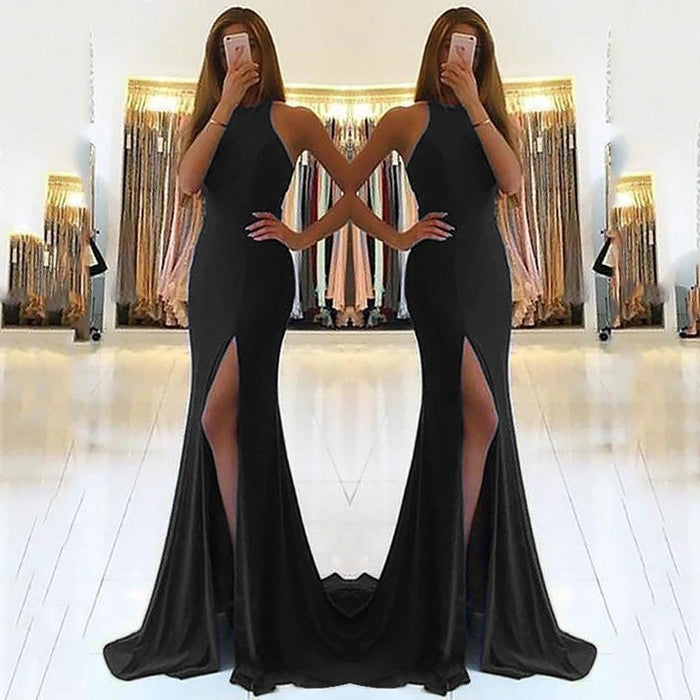 Long elegant ladies' evening dress by MANDOTOS, featuring a flowing fabric and formal design, suitable for special occasions.