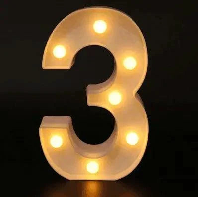 Mandotos luminous letter lights spelling out "LOVE" with warm LED glow, perfect for room decor or ambient lighting.