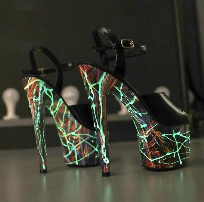 Mandotos lustrous leather stilettos with pointed toes and sleek heel, showcasing elegant footwear design.