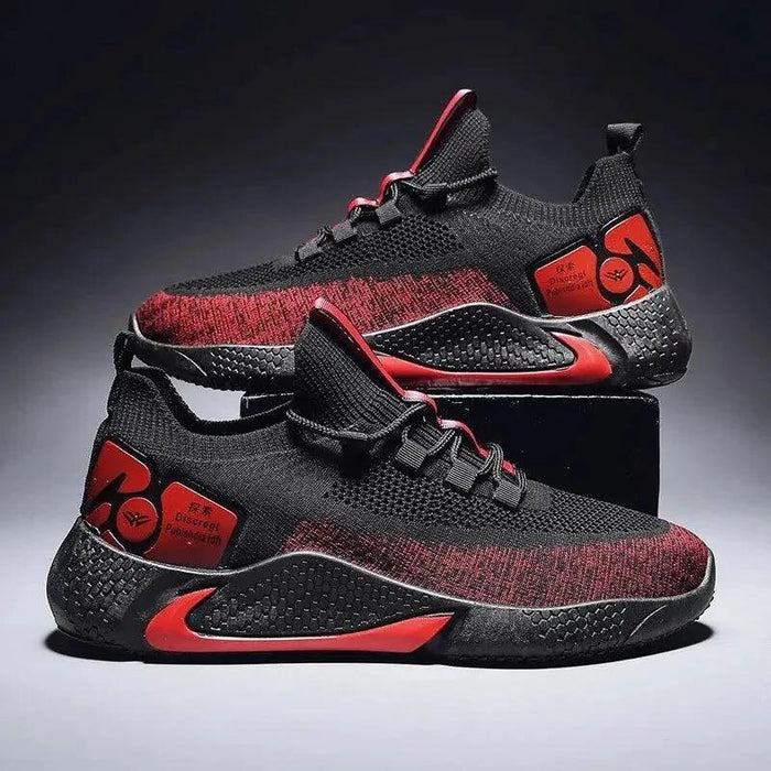 Men's athletic trainer shoes by MANDOTOS featuring breathable mesh uppers and cushioned soles for comfort and support.