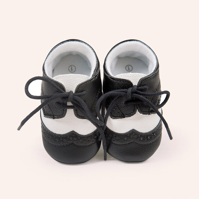 Ancient Energy men's baby shoes with soft soles, ideal for walking and early stages of toddler development.