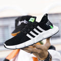 Men's breathable mesh sports shoes by MANDOTOS with flying weave upper and lightweight design for athletic comfort