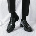 Men's elegant breathable tassel loafers by MANDOTOS, showcasing stylish leather shoes with tassel details and comfortable design.