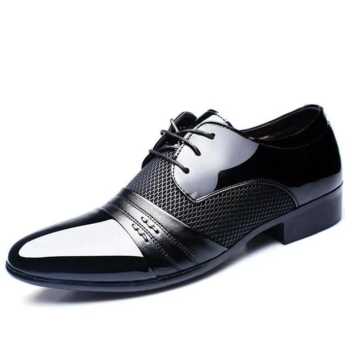 Men's formal shoes by MANDOTOS, stylish black leather dress shoes with sleek design and lace-up closure.