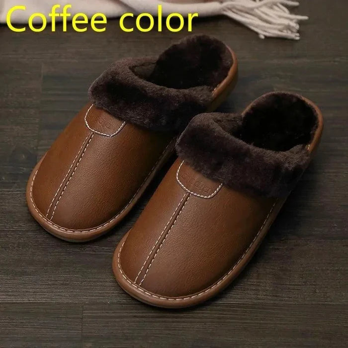 Men's luxury leather slippers by MANDOTOS featuring soft leather with elegant stitching and a comfortable slip-on design.