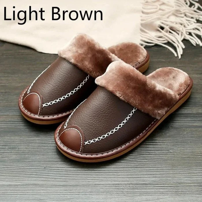 Men's luxury leather slippers by MANDOTOS, featuring soft leather uppers and comfortable slip-on design.