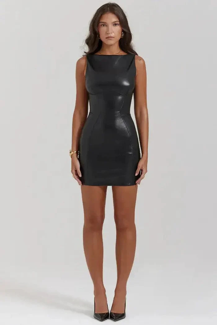 Mini leather black dress by MANDOTOS, featuring a fitted silhouette and stylish design, shown on a model.
