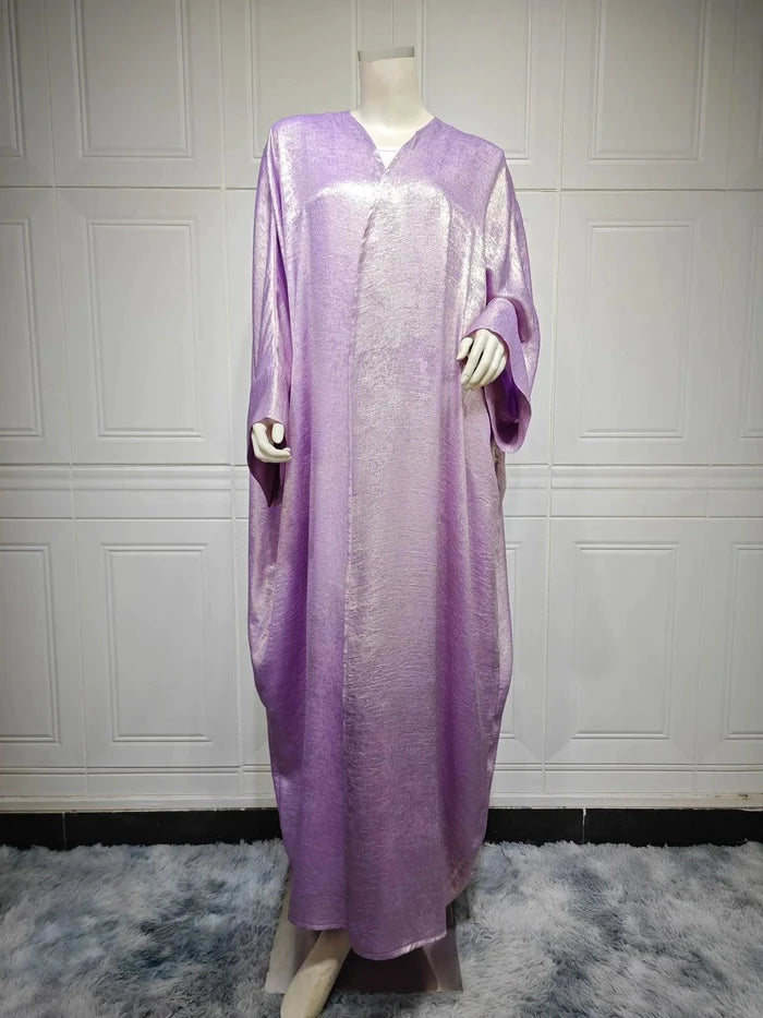 Mandotos Muslim robe abaya in black fabric with elegant flowy design, traditional Islamic fashion for women.