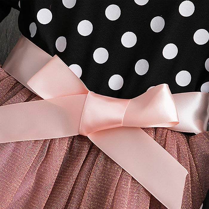Polka dot princess dress for young girls by Ancient Energy, featuring a charming design with ruffles and a satin bow.