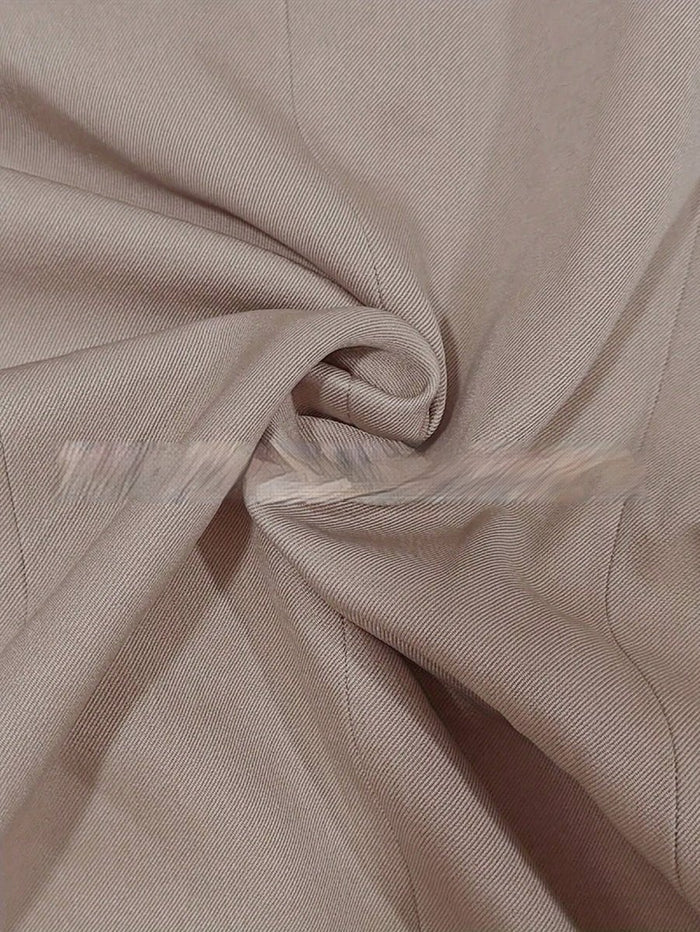 Elegant formal blazer by Ancient Energy featuring contrasting color buttons and a tailored fit for professional wear.