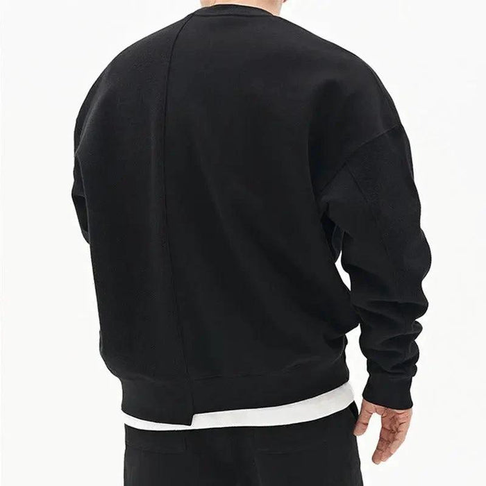 Loose men's pullover round neck sweater by MANDOTOS, showcasing a cozy fit and classic style in neutral fabric.