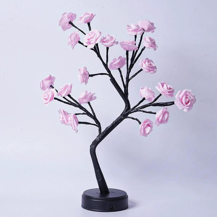 Mandotos Rose Flower Tree Table Lamp with USB fairy night light on a desk, decorative floral design for cozy lighting.