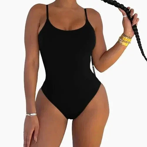 Mandotos sculpting beachwear bodysuit in black, featuring a fitted design with adjustable straps and seamless finish.