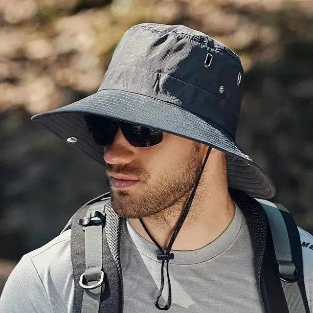 Mandotos sun-safe stylish bucket hat with wide brim and breathable fabric for sun protection and summer outdoor wear.