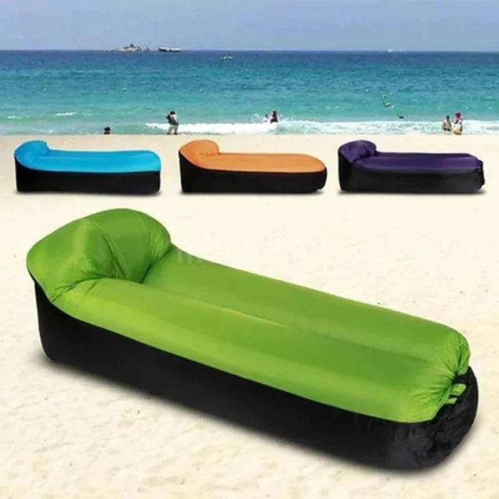 Mandotos SunScape inflatable lounger laid out outdoors, showcasing its portable design and comfortable, effortless relaxation experience.