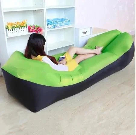 Mandotos SunScape Inflatable Lounger laid out for relaxation, showing its lightweight, portable design and comfortable fabric.