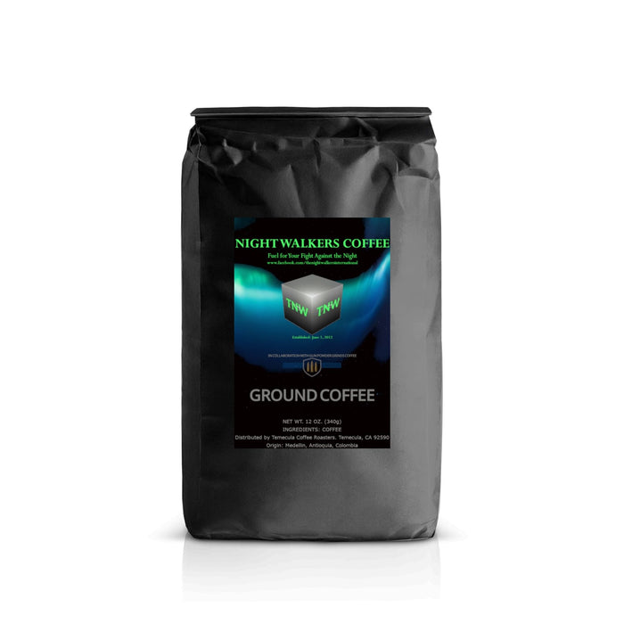 Black coffee bag with 'Nightwalkers Coffee' label on a white background