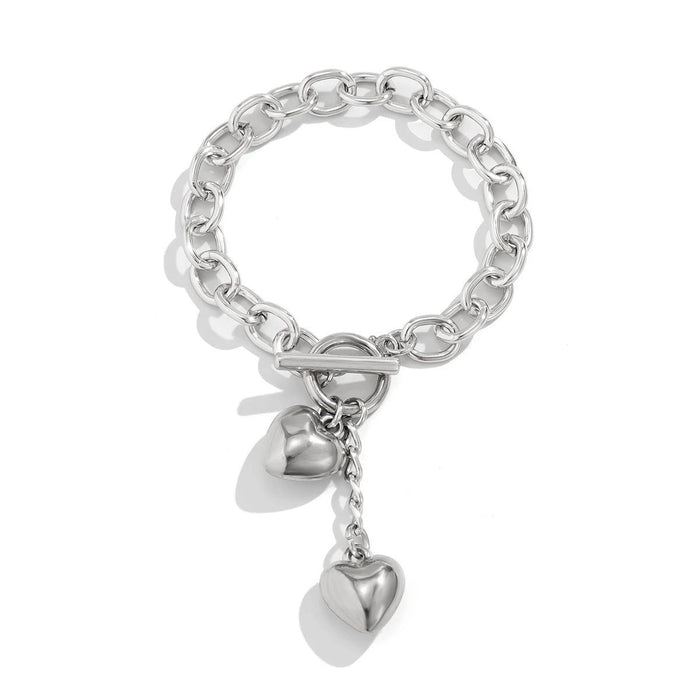 Mandotos thick chain necklace with lock and key pendant, trendy fashion jewelry piece showcasing bold design and metallic finish.