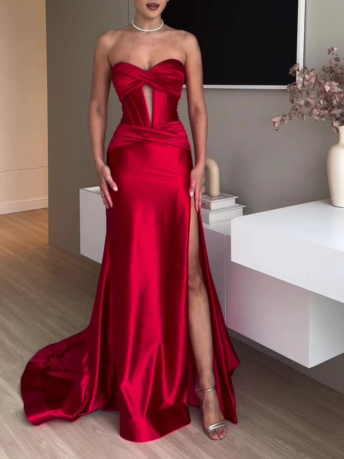Red extra long evening dress by MANDOTOS featuring a tube top and side slit, perfect for formal occasions.