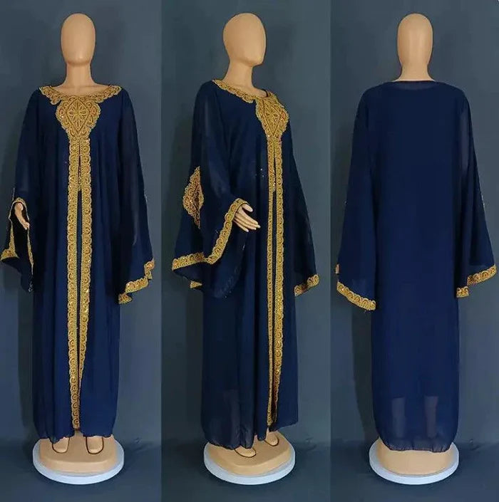 Mandotos two-piece gold kaftan abaya dress with flowing fabric and intricate detailing, perfect for elegant occasions.