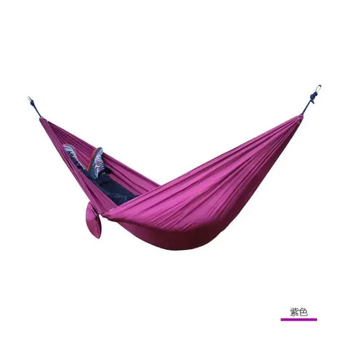 Mandotos Ultimate Oasis single and double hammock with sturdy fabric and wooden spreader bars for outdoor relaxation.