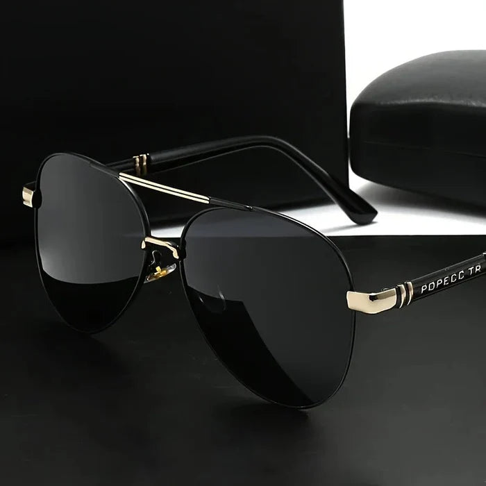 Unisex polarized stylish eyewear by Mandotos International, suitable for travel and driving, with sleek frame and tinted lenses.