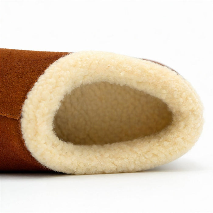 Cozy women's suede slippers from Bread's Ashton Edition with plush lining and slip-on design for comfortable indoor wear.