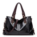 Women's large capacity soft leather shoulder messenger handbag by Ancient Energy, featuring multiple compartments and a stylish design.